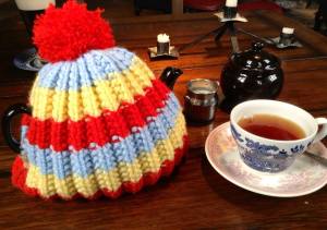 Yorkshire tea, served in a ‘Brown Betty’ teapot with knitted hat cosy