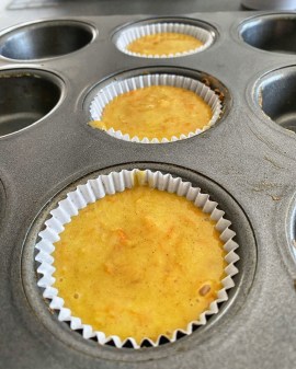 Carrot muffin batter in tin