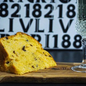 A slice of panettone and a glass of bubbly